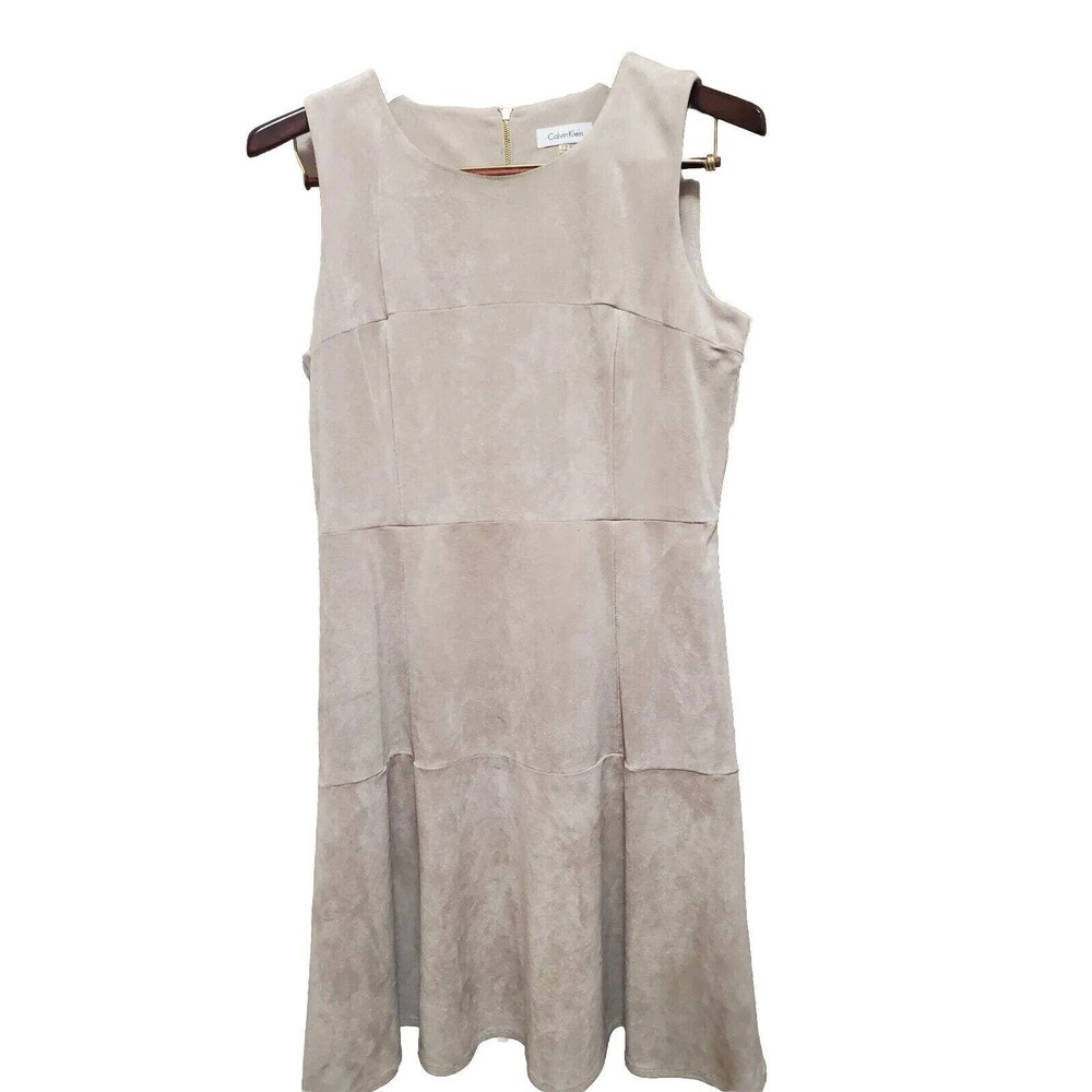 Calvin Klein faux suede dress, fully lined, and tan in color. Dress is size 12.